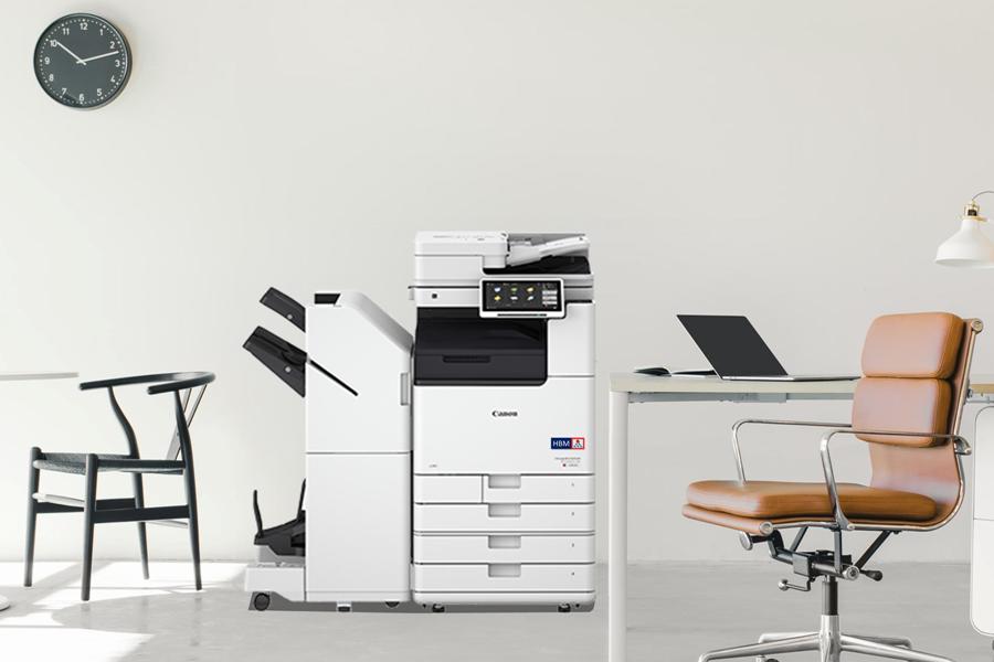 imageRUNNER ADVANCE DX C3830i in the office with 4 paper drawers and saddle stitch finisher