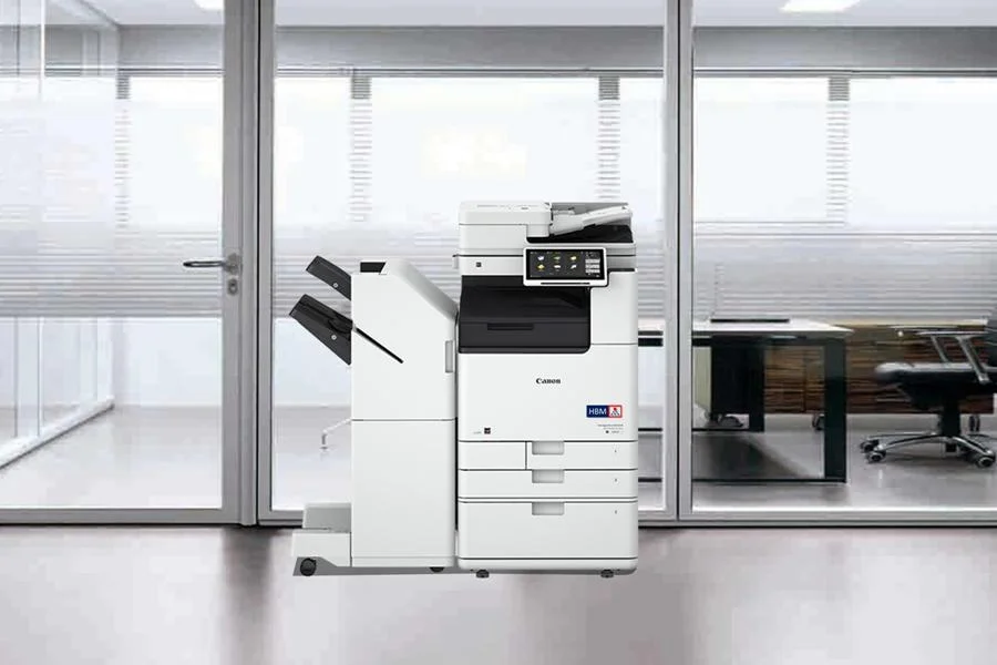 imageRUNNER ADVANCE DX 4935i in the office with finisher and large capacity paper drawer